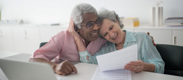 Couple reviewing life cover